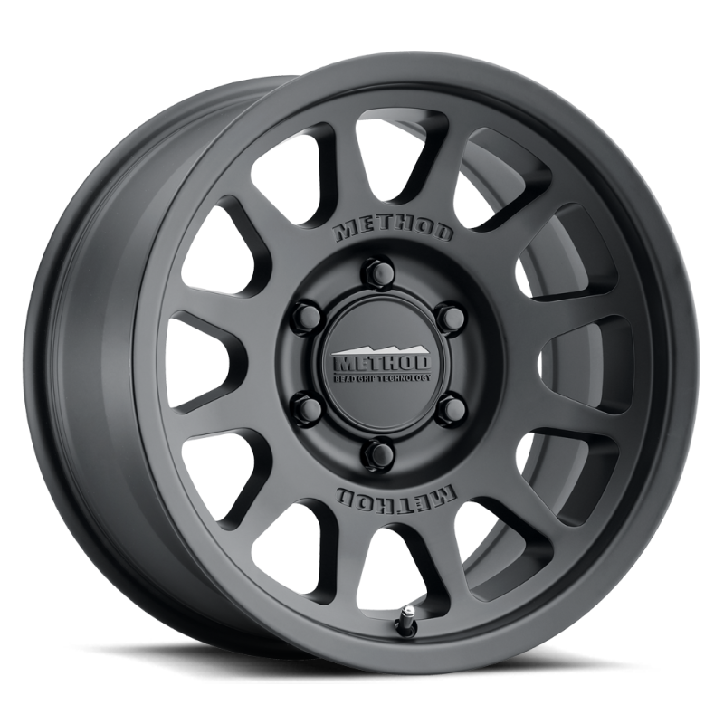 Method MR703 17x8.5 +25mm Offset 6x135 87mm CB Matte Black Wheel